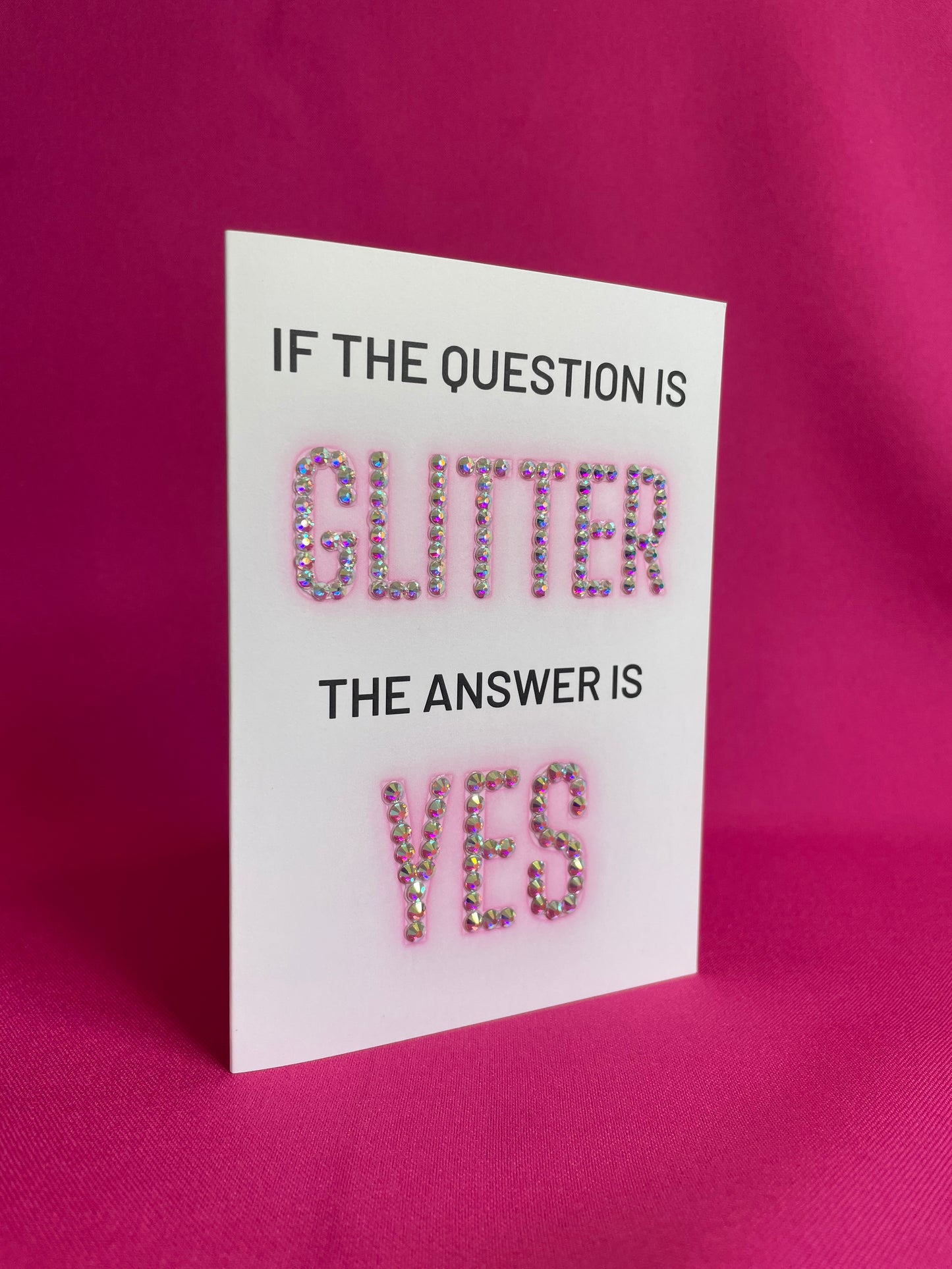 If the question is Glitter the answer is YES Postkaart